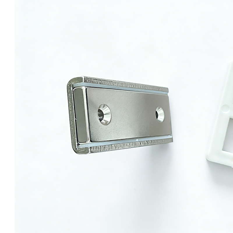 Real nickel-plated channel magnets arranged in rows, each with countersunk screw-mounting holes.