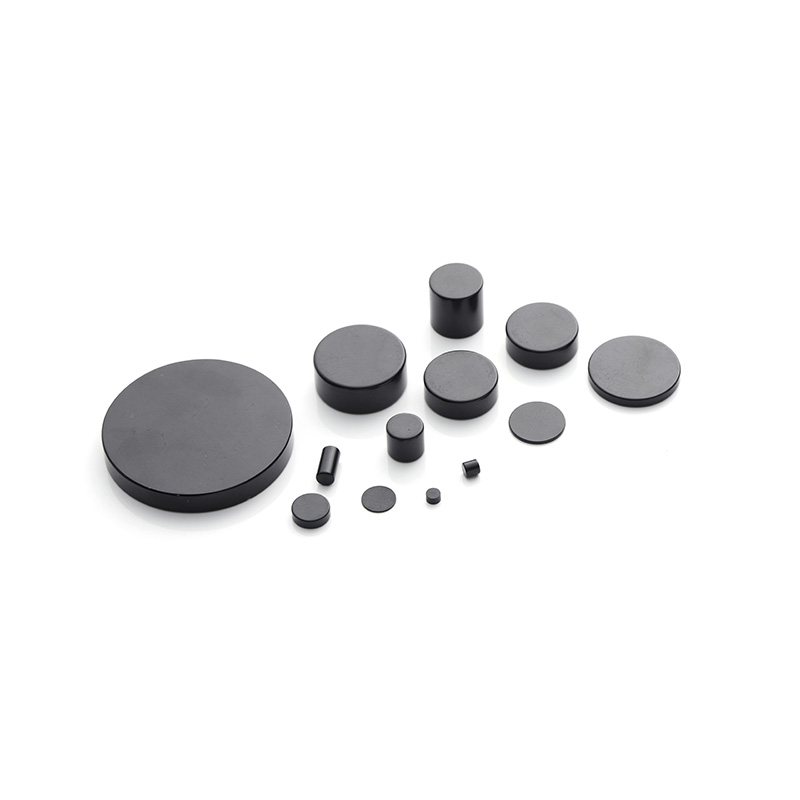 Nickel-plated cylindrical neodymium magnets in several diameters and lengths arranged on a white background.