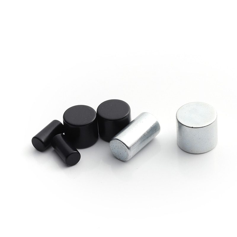 Zinc coated neodymium block magnets in multiple sizes on a white background Zinc coated neodymium block magnets in multiple sizes on a white background