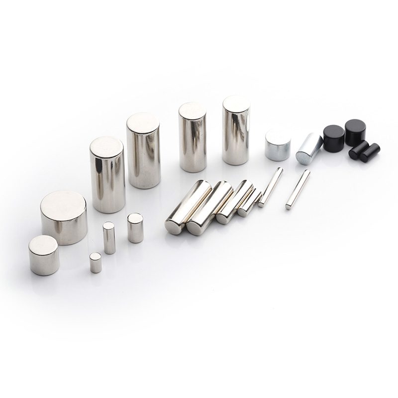 Assorted nickel-plated neodymium block magnets on a white background